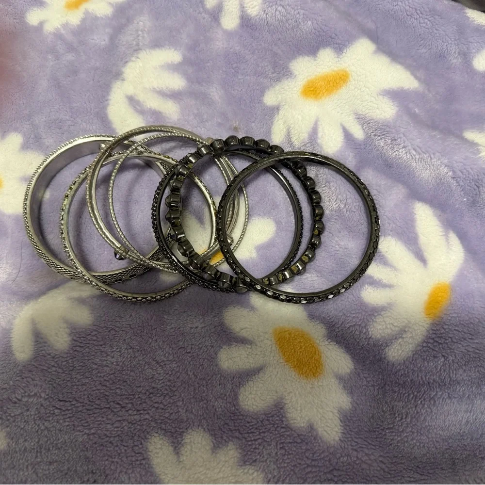 Stylish Silver and Black Bangle Set
You get all for one low price - Picture 11 of 12
